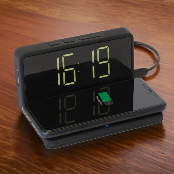 THE SOURCE WIRELESS PHONE CHARGING ALARM CLOCK
