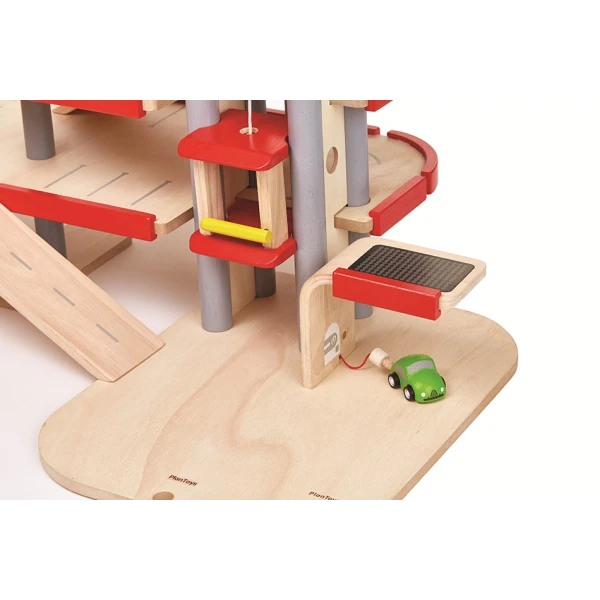PLAN TOYS RACE N PLAY PARKING GARAGE RED