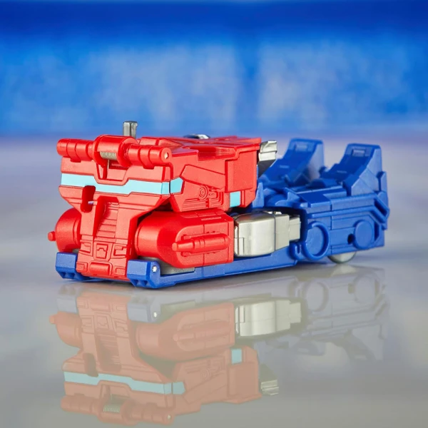 TRANSFORMERS ONE COG CHARGER FIGURE 10 cm OPTIMUS PRIME